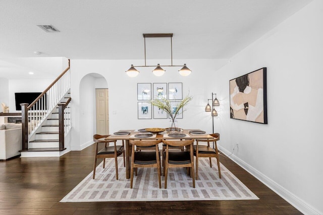 kitchen featuring visible vents, light countertops, appliances with stainless steel finishes, white cabinets, and a sink