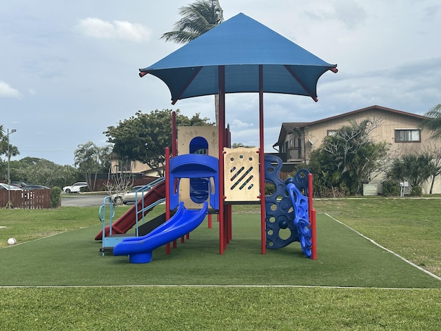 communal playground with a lawn