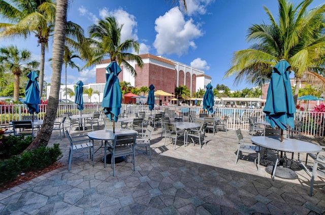 view of patio / terrace featuring fence