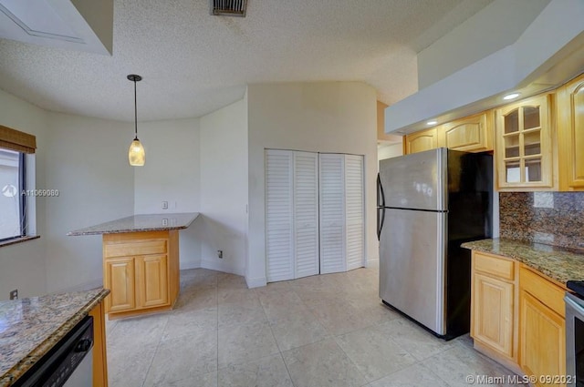 kitchen featuring backsplash, glass insert cabinets, light brown cabinetry, light stone counters, and appliances with stainless steel finishes