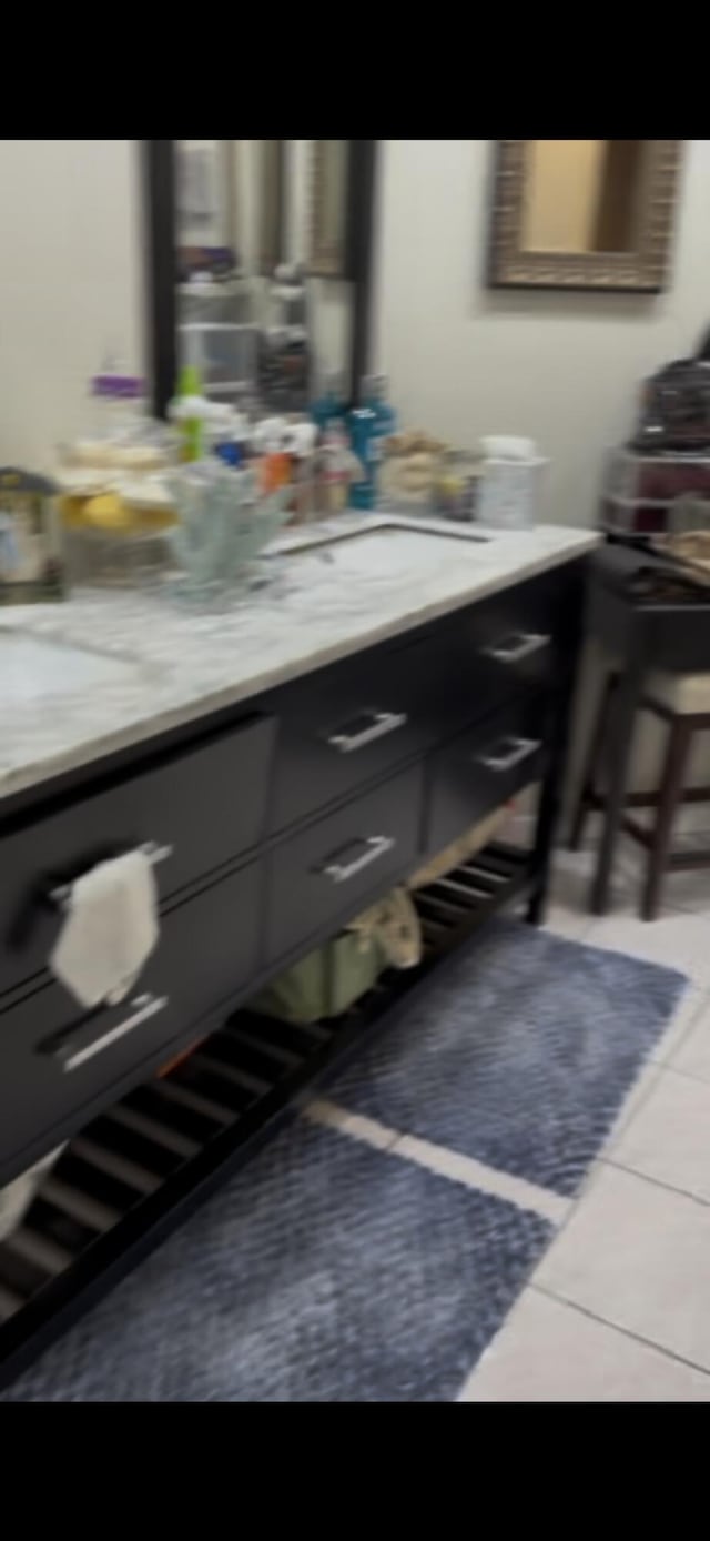 bar with tile patterned floors