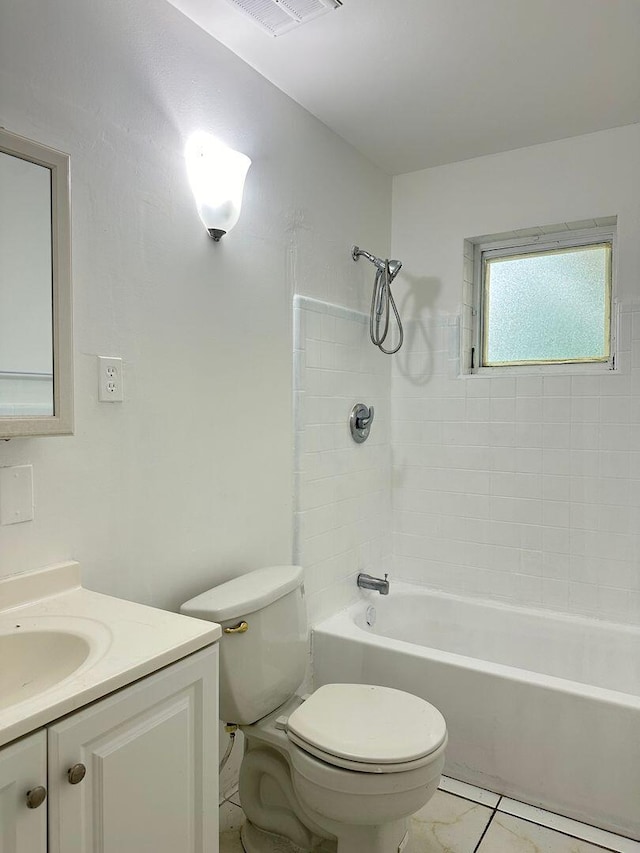 bathroom with shower / washtub combination, visible vents, vanity, and toilet