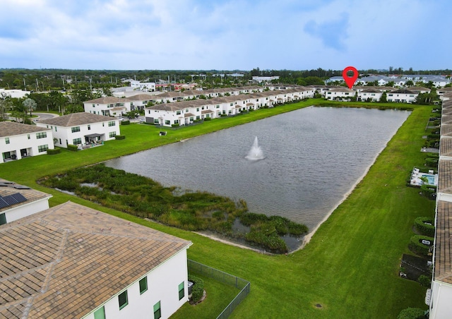 aerial view featuring a water view and a residential view