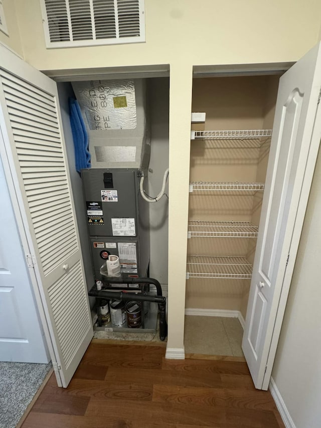 utility room featuring visible vents