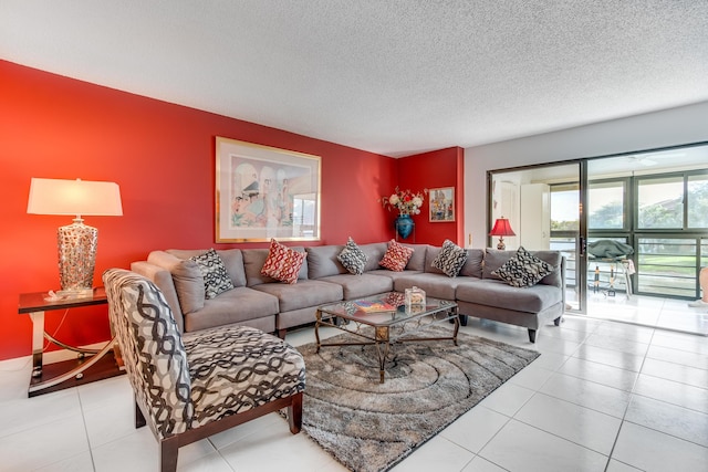 living room featuring a textured ceiling and tile patterned floors