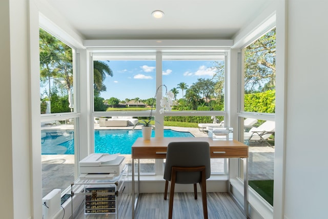 sunroom / solarium with a wealth of natural light