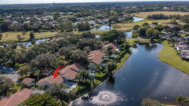 birds eye view of property with a residential view and a water view