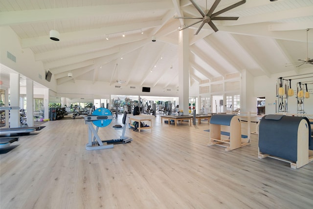 gym featuring a wealth of natural light, visible vents, and wood finished floors