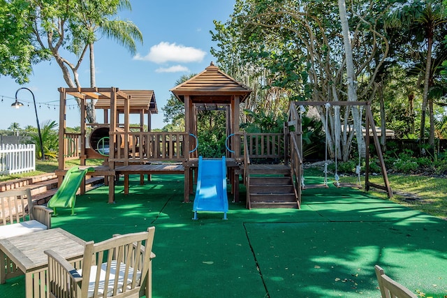 community play area featuring fence