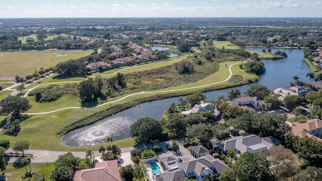 birds eye view of property with a residential view and a water view