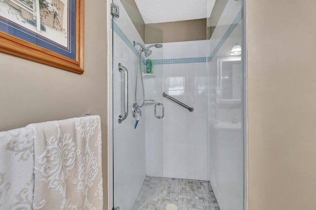 full bath featuring a stall shower