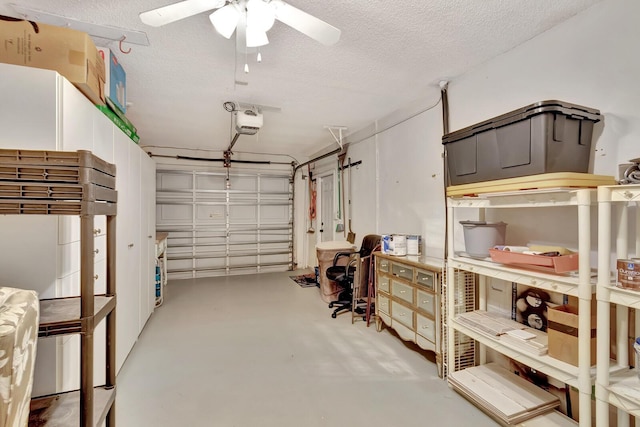 garage with a ceiling fan and a garage door opener