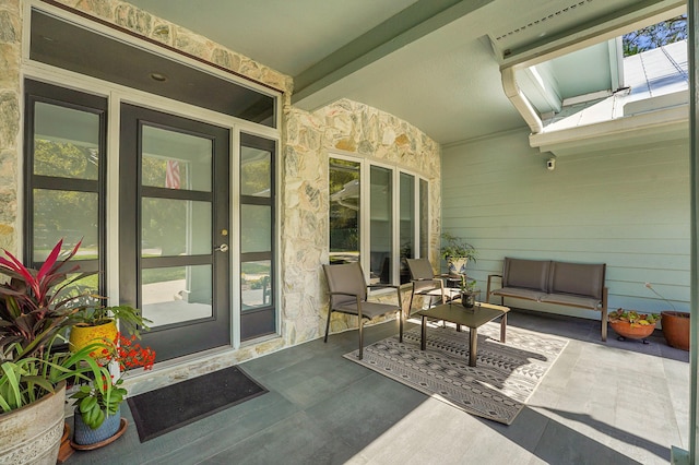 exterior space featuring an outdoor hangout area