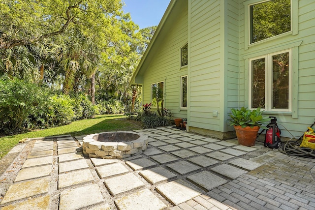 view of patio / terrace featuring a fire pit