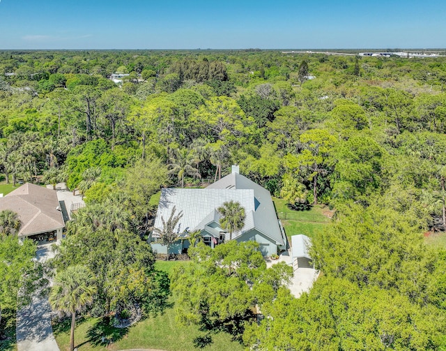 aerial view featuring a forest view