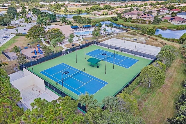 aerial view featuring a residential view and a water view