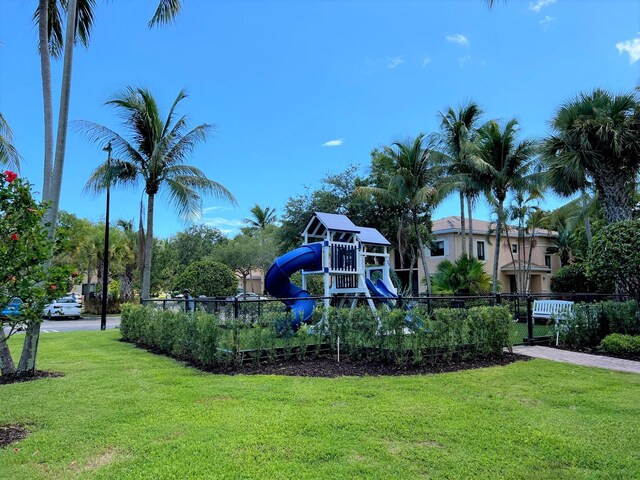 view of property's community with a sport court