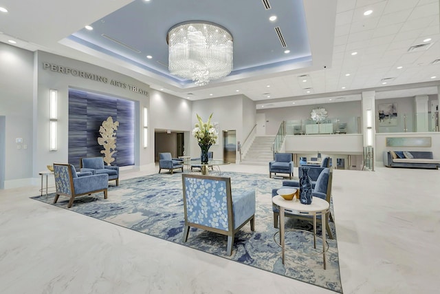 building lobby featuring stairs and visible vents