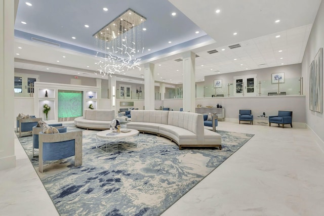 living room featuring marble finish floor, visible vents, and recessed lighting