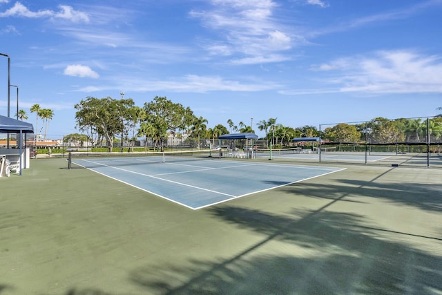 view of sport court with fence