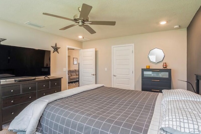 bedroom featuring visible vents and a ceiling fan