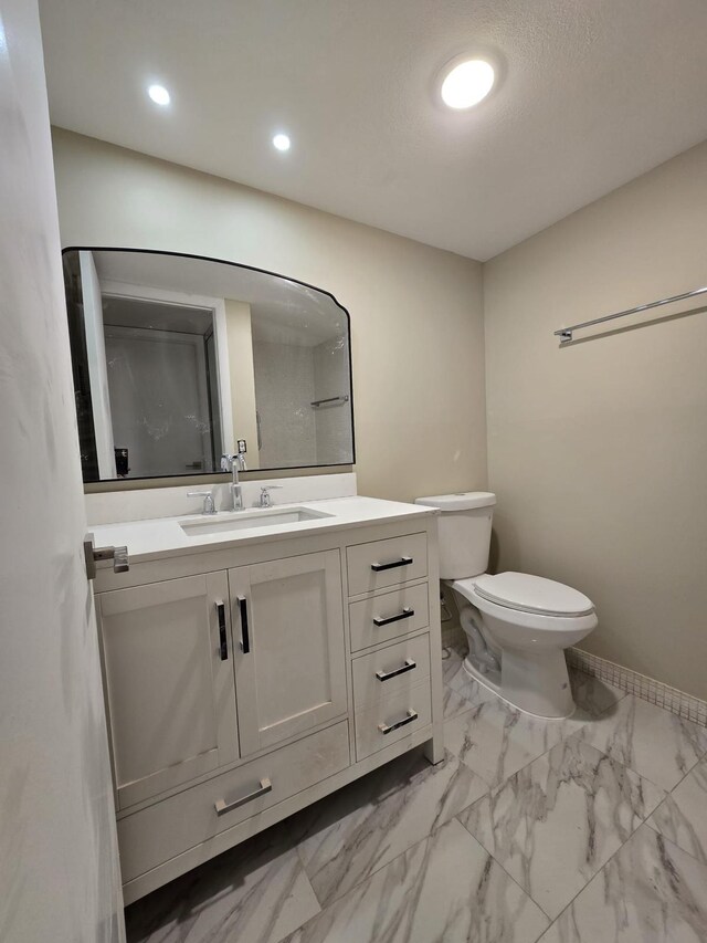 774 Burgundy Q, Delray Beach, FL 33484 - bathroom with vanity, toilet, marble finish floor, recessed lighting, and baseboards
