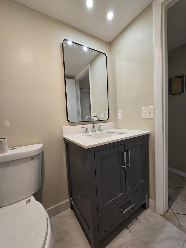 774 Burgundy Q, Delray Beach, FL 33484 - half bathroom with recessed lighting, baseboards, vanity, and toilet