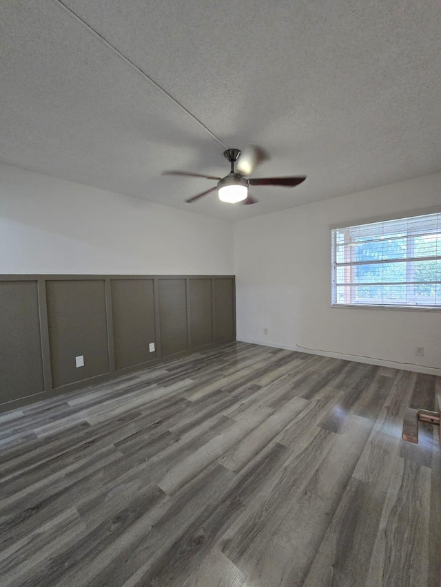 774 Burgundy Q, Delray Beach, FL 33484 - unfurnished room featuring a textured ceiling, ceiling fan, and wood finished floors
