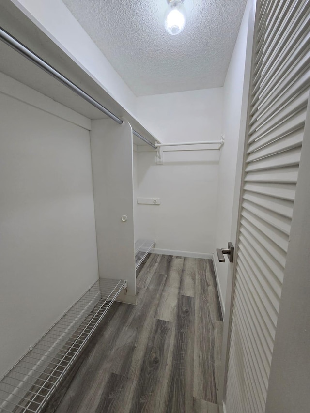 774 Burgundy Q, Delray Beach, FL 33484 - spacious closet featuring wood finished floors
