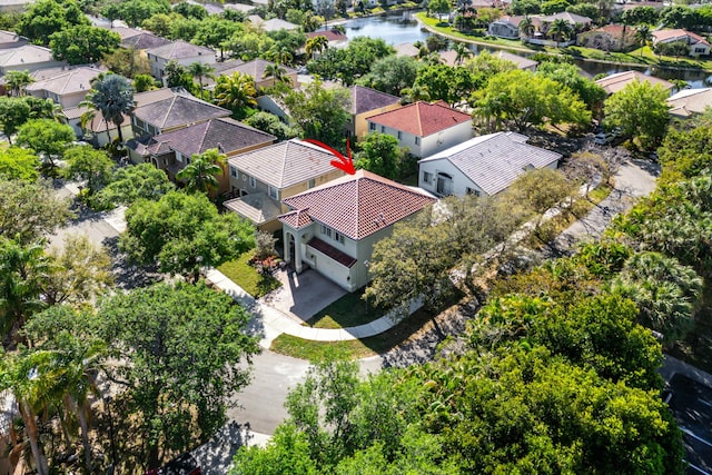 aerial view with a residential view and a water view