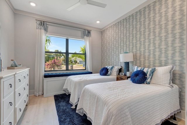 bedroom featuring wallpapered walls, baseboards, recessed lighting, light wood-style flooring, and a ceiling fan