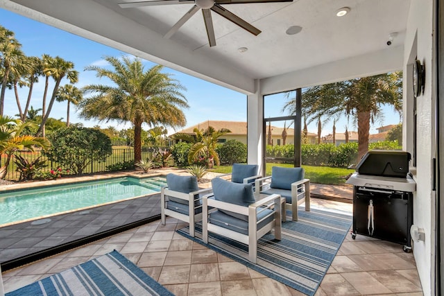 view of patio / terrace featuring area for grilling, a fenced backyard, outdoor lounge area, a fenced in pool, and ceiling fan