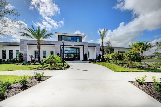 view of property featuring driveway