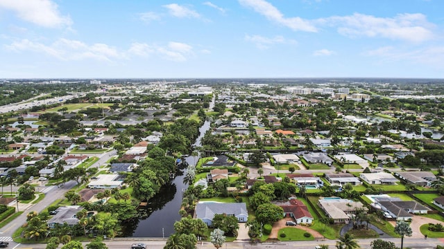 aerial view with a residential view and a water view