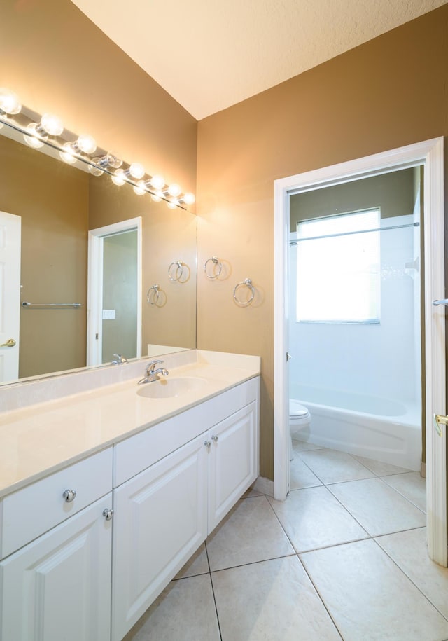 10102 Diamond Lake Rd, Boynton Beach, FL 33437 - bathroom featuring tile patterned floors, toilet, and vanity