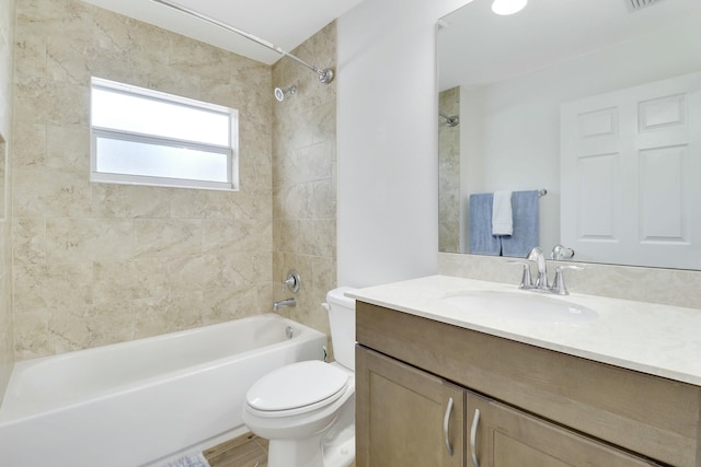 full bath featuring visible vents, vanity, shower / tub combination, and toilet