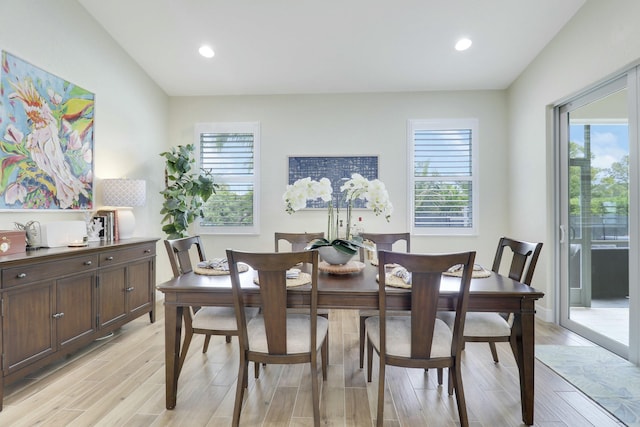 dining space with light wood-style floors and recessed lighting