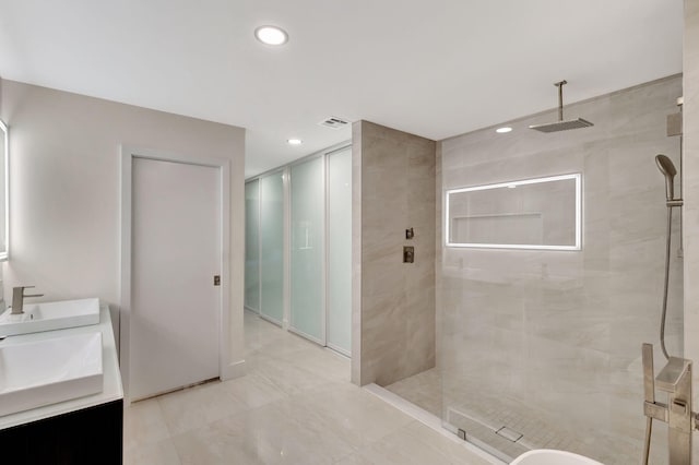 181 Cape Pointe Cir, Jupiter, FL 33477 - full bathroom with a shower stall, double vanity, recessed lighting, and tile patterned floors