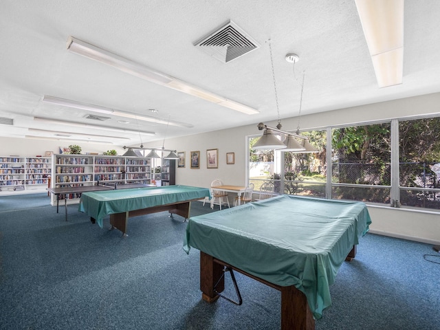 recreation room featuring carpet, billiards, visible vents, and a textured ceiling