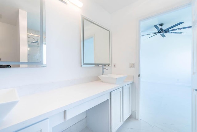 full bathroom featuring marble finish floor, vanity, walk in shower, and a ceiling fan