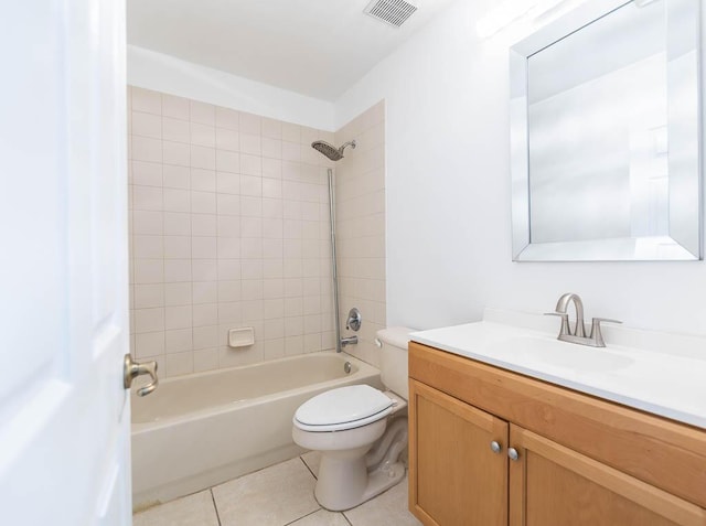 full bath featuring vanity, washtub / shower combination, visible vents, tile patterned floors, and toilet