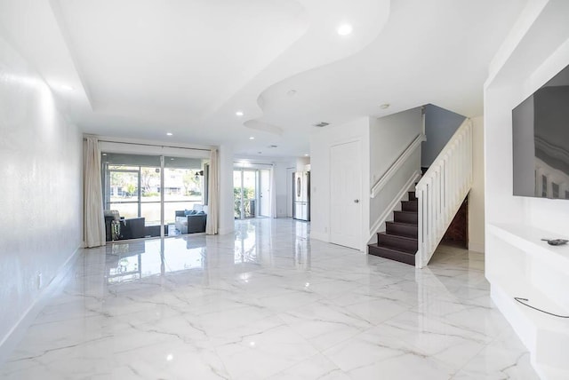 unfurnished room featuring visible vents, baseboards, stairway, recessed lighting, and marble finish floor