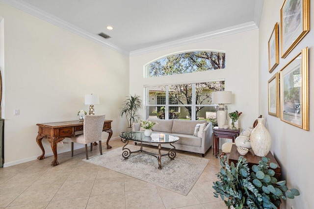 living area featuring ornamental molding, visible vents, baseboards, and light tile patterned floors