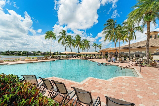 community pool featuring a patio area