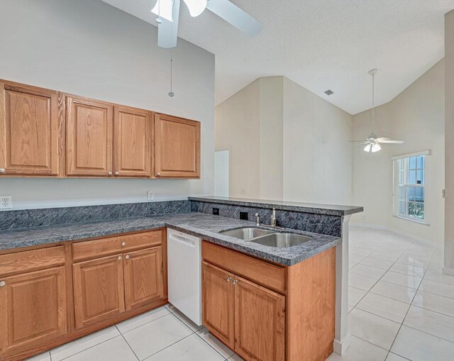 kitchen featuring white appliances and light tile patterned floors