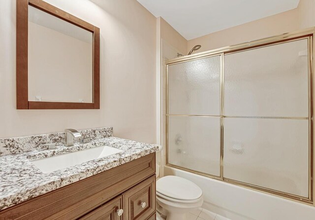 empty room featuring baseboards, visible vents, and wood finished floors