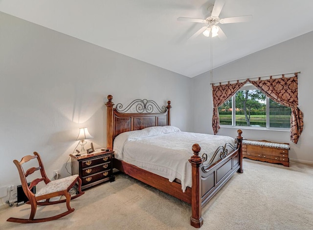 bedroom featuring a ceiling fan, light carpet, baseboards, and lofted ceiling