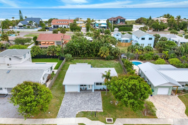 aerial view featuring a water view and a residential view