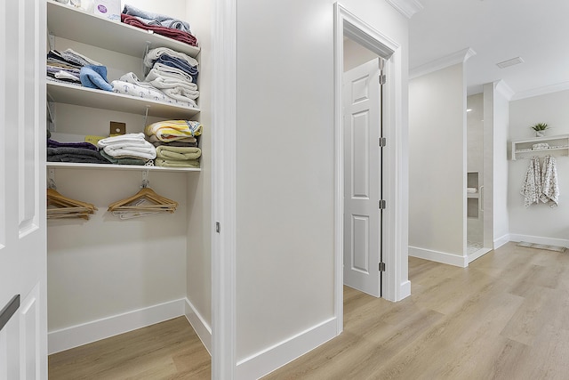 closet featuring visible vents