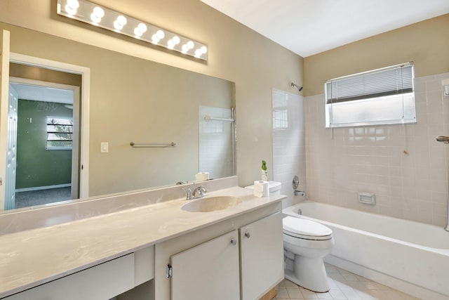 bathroom with tile patterned flooring, plenty of natural light, toilet, and shower / bath combination